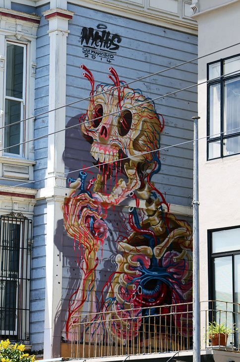 Heart Out mural by Nychos